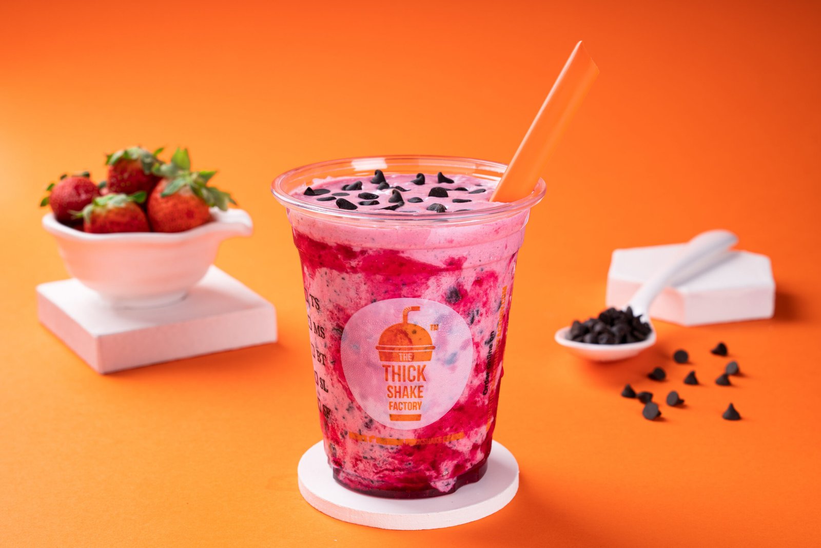 Strawberry choco chip thick shake in Dubai with chocolate chips and fresh strawberries